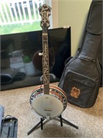 Banjo with case and stand, you can teach yourself
