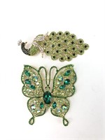 Bright! Rhinestone butterfly and peacock brooches.