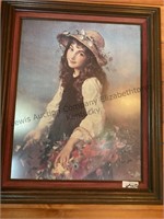 Large picture of young girl gathering flowers and