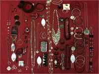 77 pieces of silver and black costume jewelry, 15