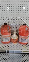 Three partial containers bar and chain oil