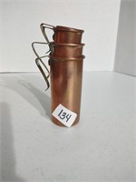 Copper Revere Ware measuring cups, brass handles.