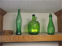 3 decorative green bottles