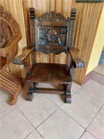 Carved oak monk chair