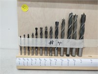 large assortment of woodworking drill bits