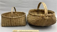 2 Woven Baskets incl Buttocks
