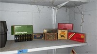 Empty boxes of ammo and some brass