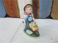 Wheelbarrow Boy Figurine