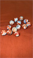 13. 5/8” +1-    Ravenswood swirl marbles