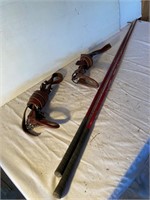 2 leather show halters and 2 show canes.