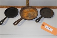 3 small cast pans