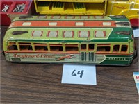Marusan Greyhound Lines Tin Litho Friction Bus