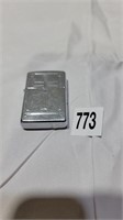 Cross engraved zippo