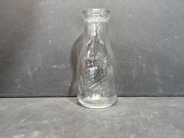 Vintage Weaver Quality milk bottle