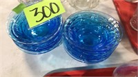 Blue glass bowls. X 12