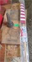 Oil spout, 2 flags, wood sign