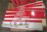 Several plastic dealer insert signs