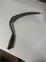 sickle wood handled