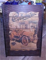 Columbia Motor Car Company sign on wood,