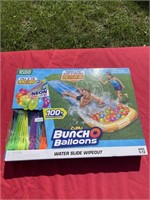 New waterslide wipe out water balloons