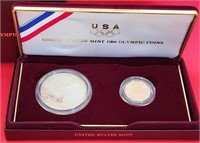 B - 1988 SILVER DOLLAR & 5 DOLLAR GOLD COINS W/ CO