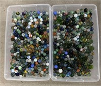 2 containers of collectible marbles