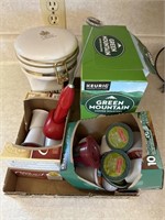 Flat of Keurig pods and frother