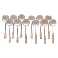Set of 12 Kirk "Repousse" sterling soup spoons