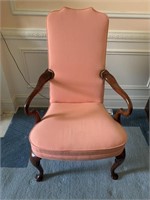 Arm chair with peach upholstery