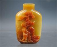 CHINESE CARVED OCHRE JADE SNUFF BOTTLE