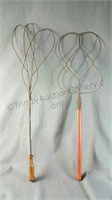 Pair of Antique Wood Handled Bent Iron Rugbeaterrs