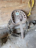 Tractor seat  & barbed wire