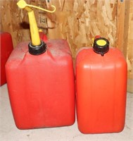 2 Plastic Gas Cans (a little < 1/4 full in each)