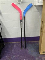 (12) Hockey Sticks and 2 Goalie Sticks