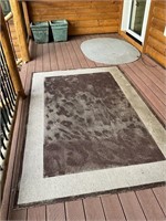 pair oif outdoor area rugs