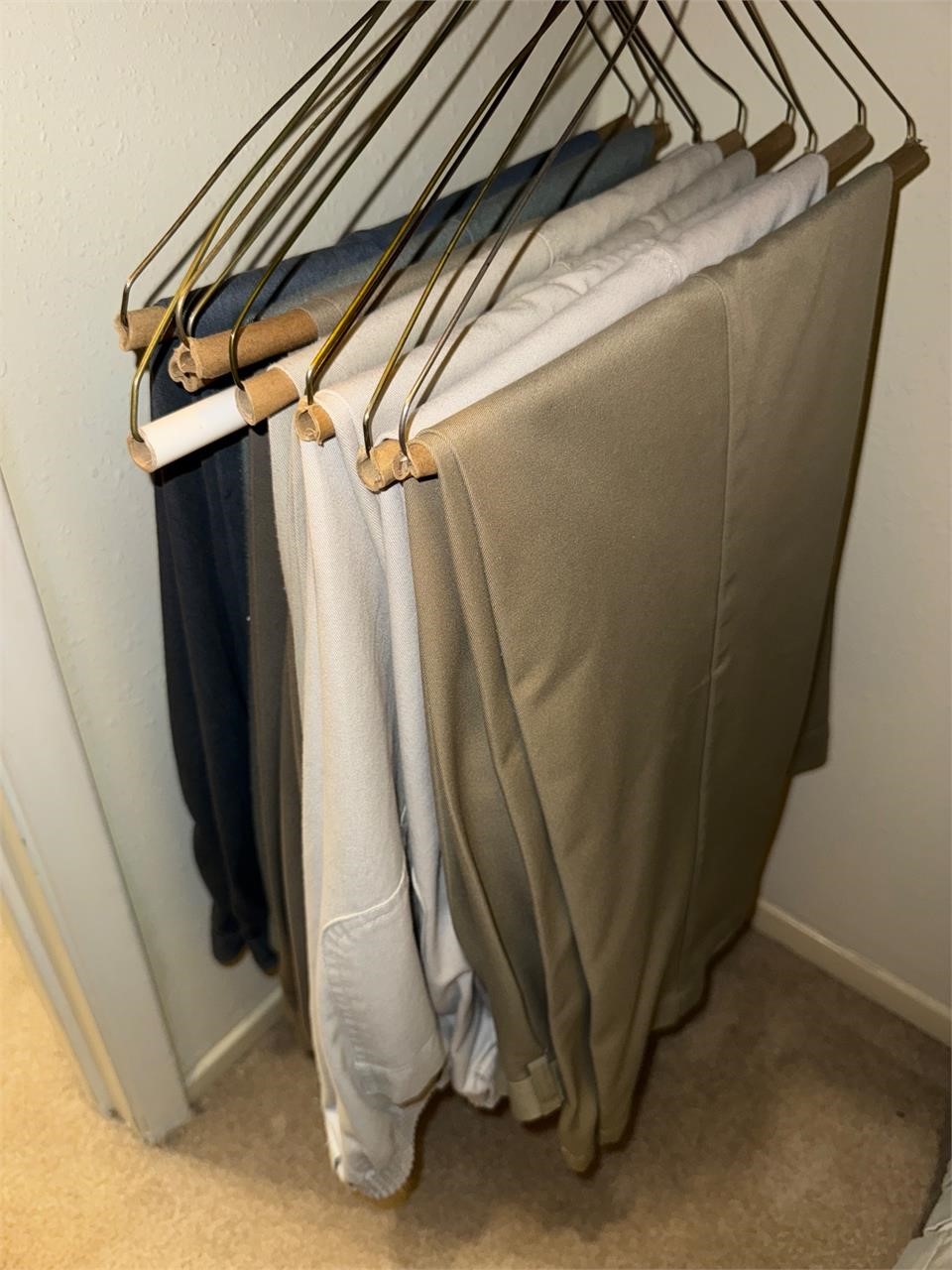 9 pairs of men's pants. Sz. 42 &44 length 29 & 30