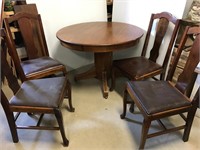 42” Pedestal table. 2 leaves 9.5”  4 chairs