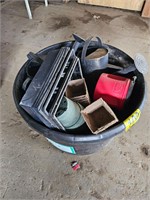 Garden tote full of trays and watering cans