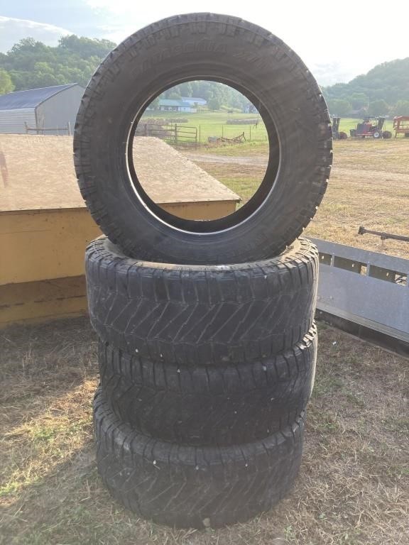 SET OF FOUR VERY USED TIRES
