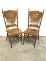 Pair of oak pressed back straight chairs