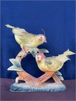 Porcelain birds w/ feathers repaired