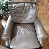 Olive colored leather chair and ottoman and