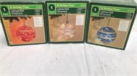 3 holiday lifted ball ornaments