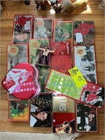 Group of Elvis themed holiday tins and a Christmas