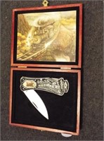 Folding pocket knife with train theme in wood