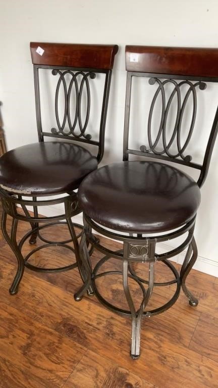 2 swivel bar stools, metal bottom, worn faux