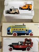 2 Tin wind up toys- 2 delivery vans