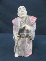 ORIENTAL FIGURE (MAN W/ SWORDS, RESIN)