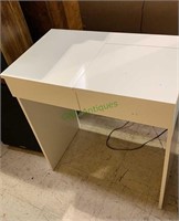 Small white vanity desk, with space for jewelry,