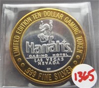 $10 .999 Silver Harrah's Vegas gaming token.